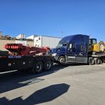Towing a Semi with the tractor on flatbed trailer
